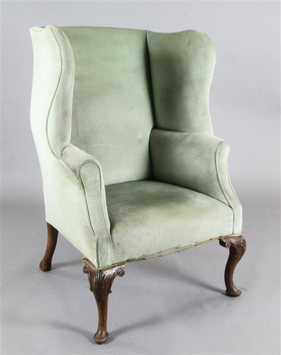 An early 18th century style mahogany wing armchair, W.2ft 7in. H.3ft 10in.